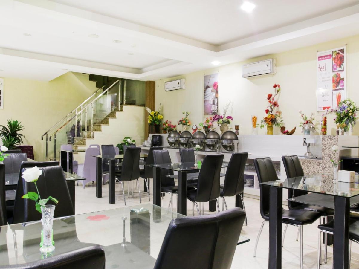 Vaccinated Staff - Capital O 454 Raising Hotel 马卡萨 外观 照片